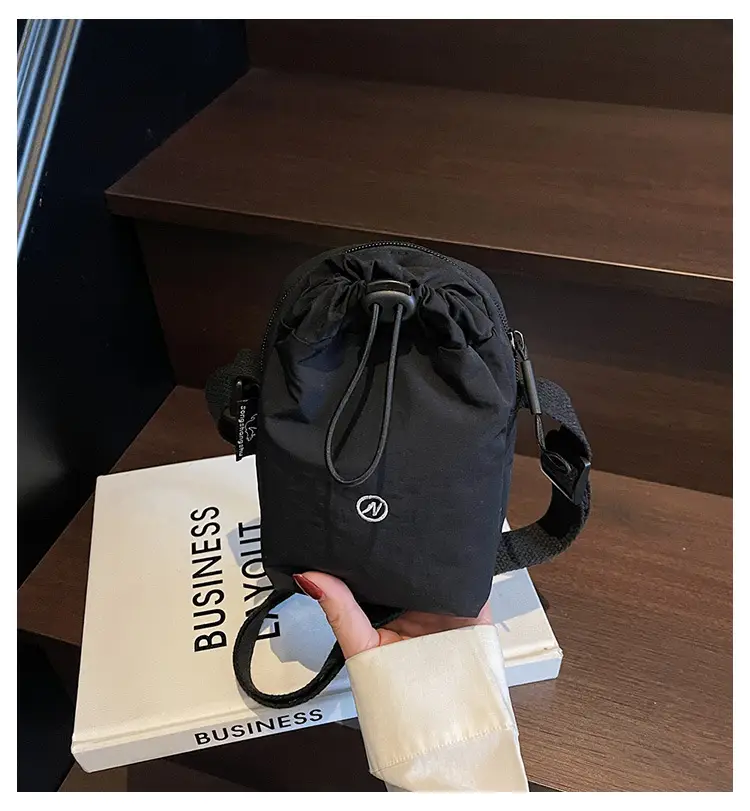 Black Waterproof Crossbody Phone Bag for Women — feature 1