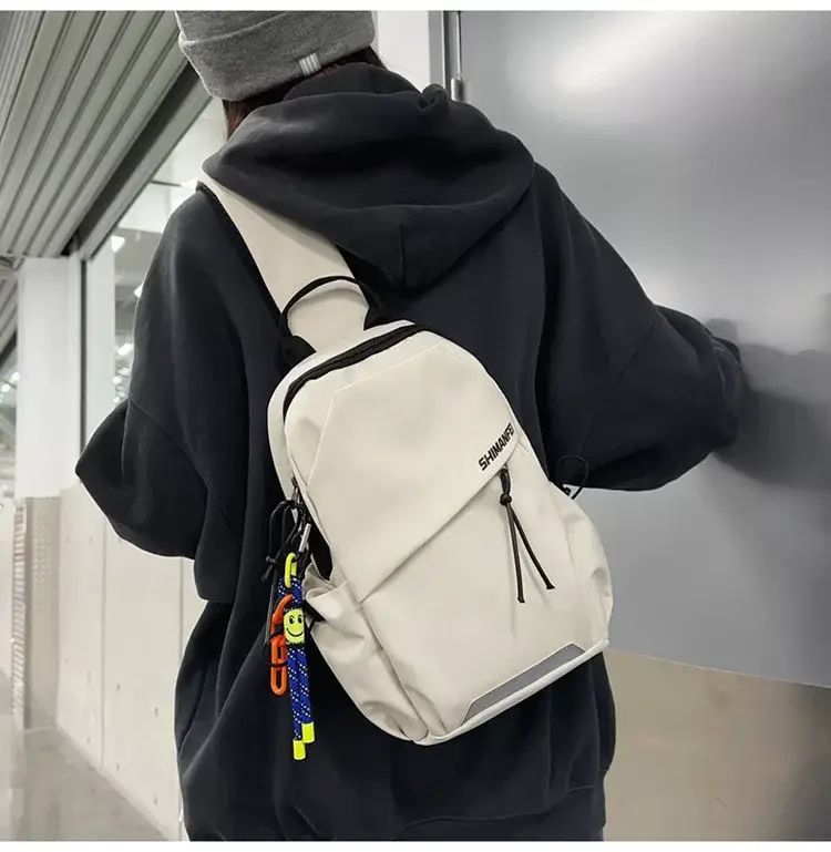 Men's White Crossbody Backpack with Colorful Accessories — feature 15