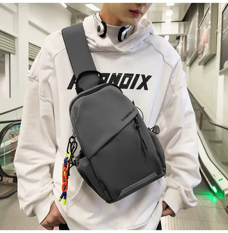 Men's White Crossbody Backpack with Colorful Accessories — feature 19