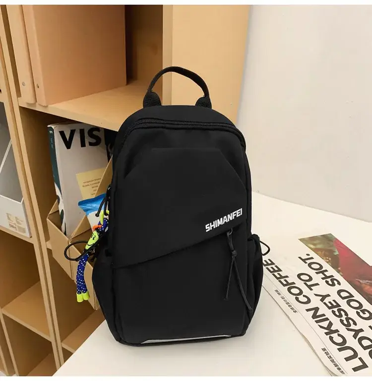 Men's White Crossbody Backpack with Colorful Accessories — feature 23