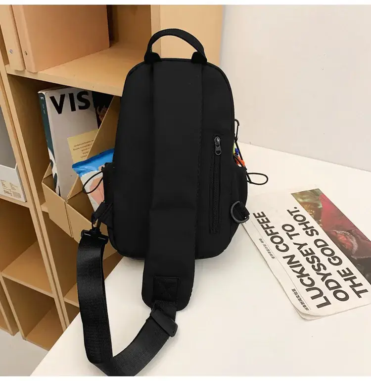 Men's White Crossbody Backpack with Colorful Accessories — feature 25