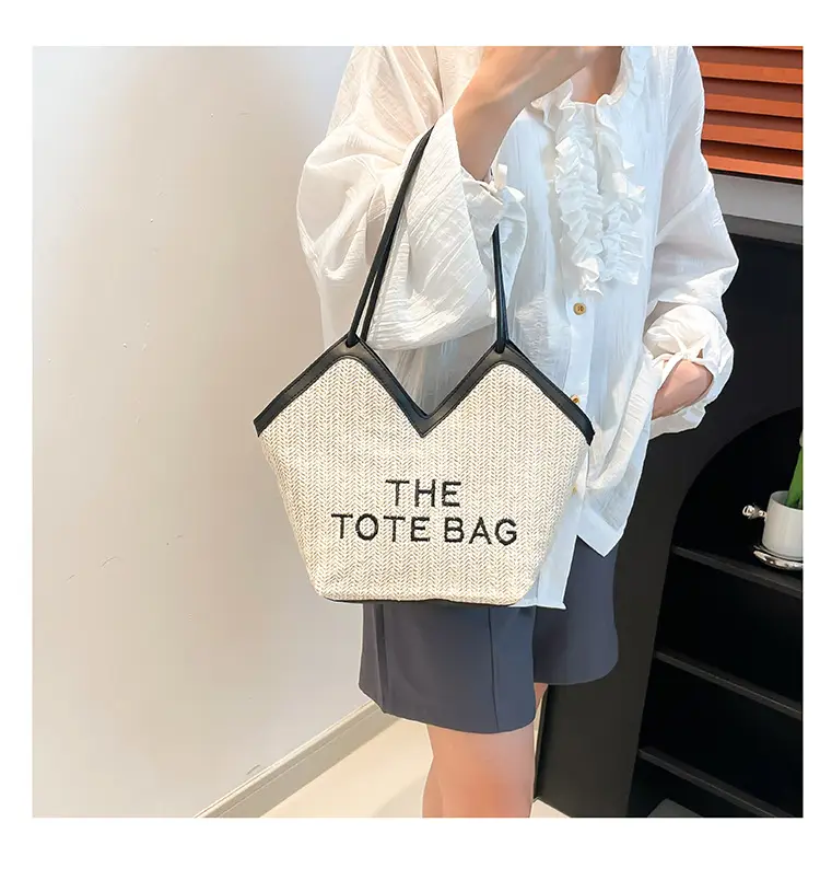 Women's Straw Bag with "THE TOTE BAG" Print — feature 10