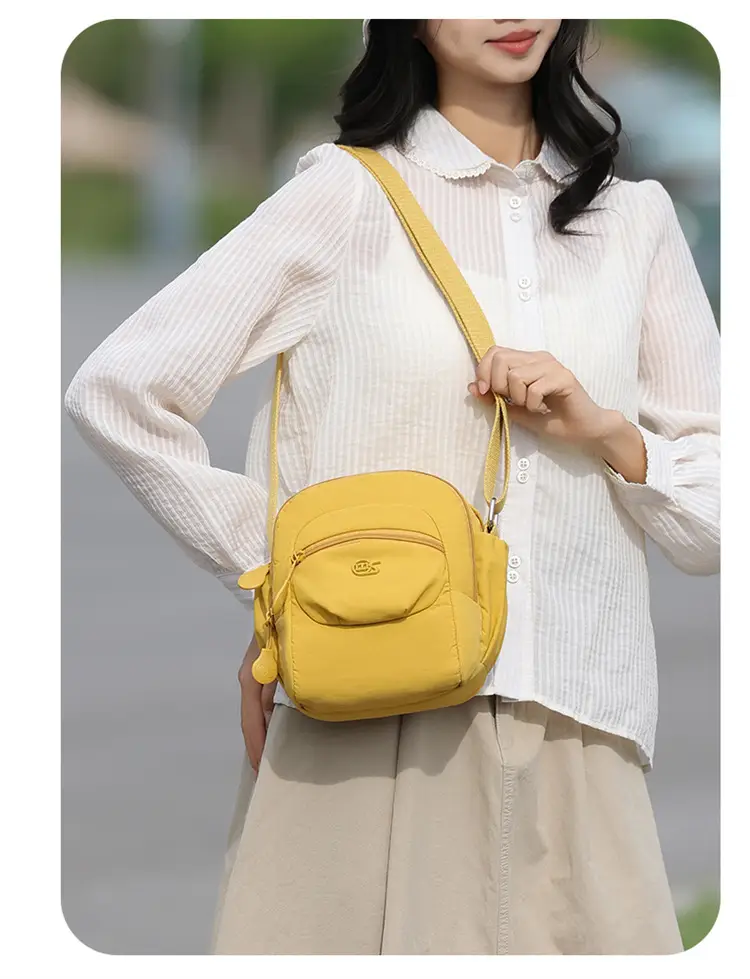 Women's Crossbody Bag Multi Layer Nylon Yellow Black — feature 15