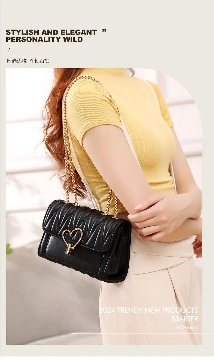 Black Heart Lock Crossbody Bag with Gold Chain — feature 1