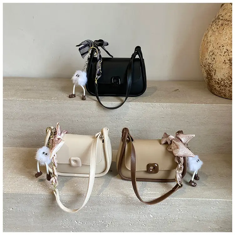 Women's Crossbody Bag with Bow & Pom Pom — feature 1