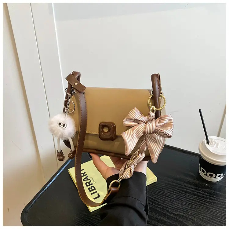 Women's Crossbody Bag with Bow & Pom Pom — feature 22