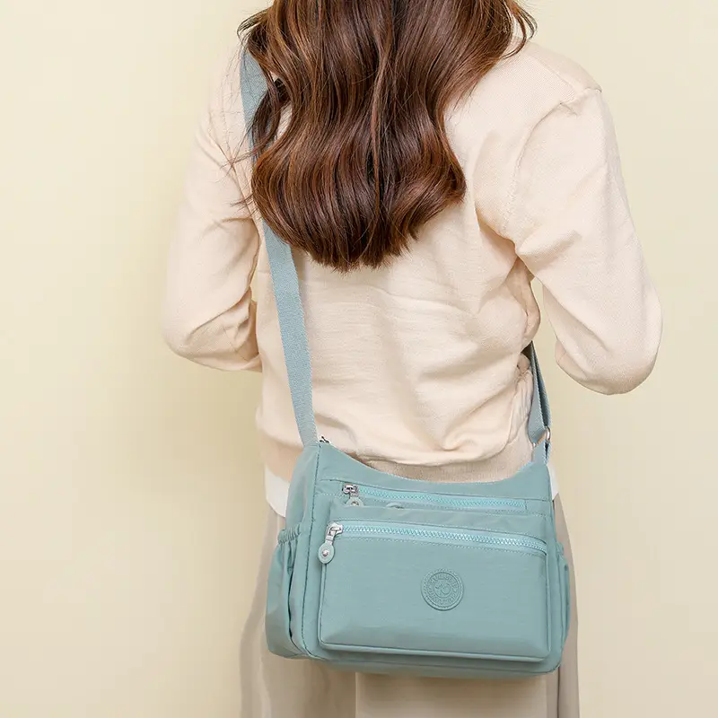 Trendy Women's Crossbody Bag Light Pink Nylon Outdoor Commuter - Image 11
