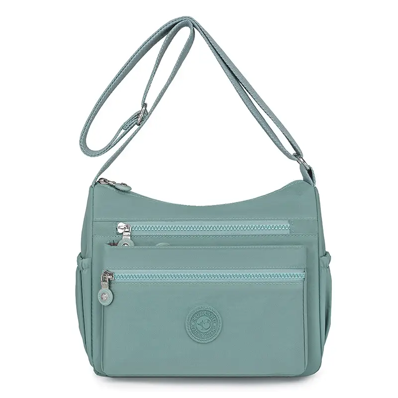 Trendy Women's Crossbody Bag Light Pink Nylon Outdoor Commuter - Image 2