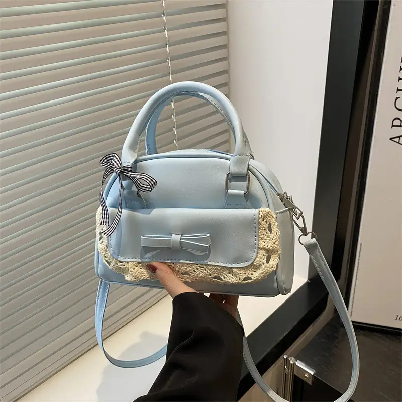 Light Blue Crossbody Bag with Bow & Embroidered Strap - Image 4