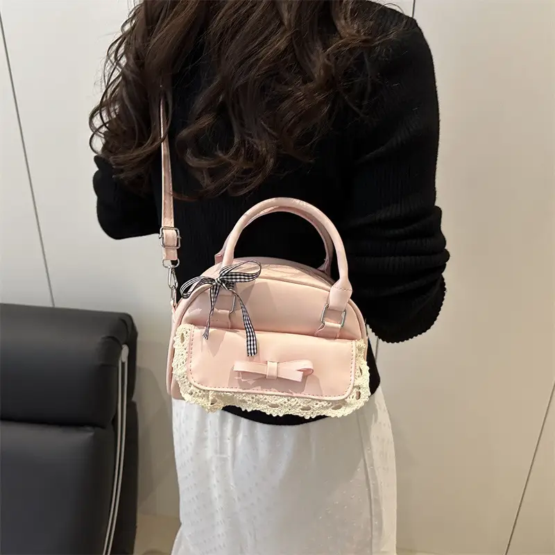 Light Blue Crossbody Bag with Bow & Embroidered Strap - Image 7