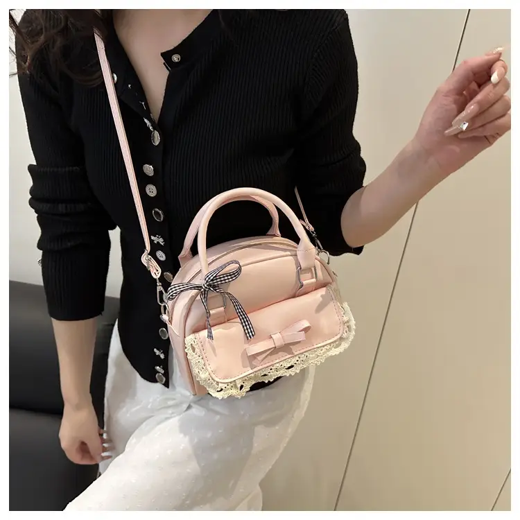 Light Blue Crossbody Bag with Bow & Embroidered Strap — feature 12