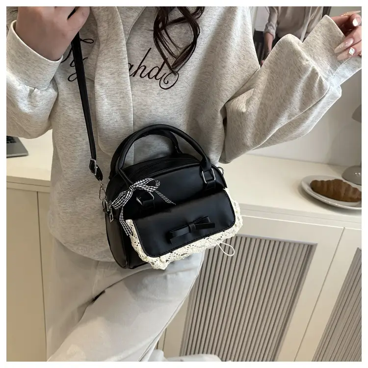 Light Blue Crossbody Bag with Bow & Embroidered Strap — feature 15