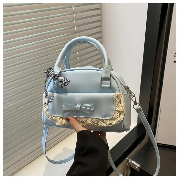 Light Blue Crossbody Bag with Bow & Embroidered Strap — feature 16