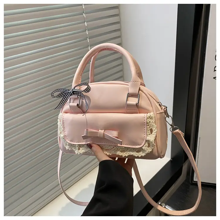Light Blue Crossbody Bag with Bow & Embroidered Strap — feature 17