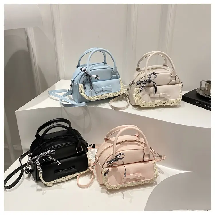 Light Blue Crossbody Bag with Bow & Embroidered Strap — feature 20