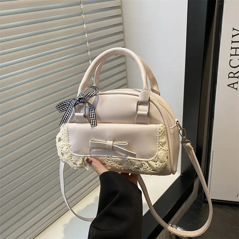 Light Blue Crossbody Bag with Bow & Embroidered Strap - Image 2