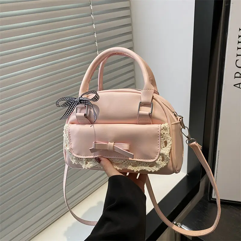 Light Blue Crossbody Bag with Bow & Embroidered Strap - Image 3