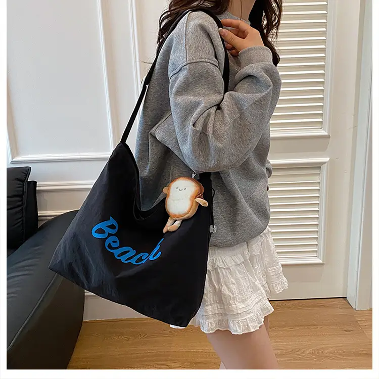 Red Drawstring Shoulder Bag with Cute Monkey Decor — feature 10