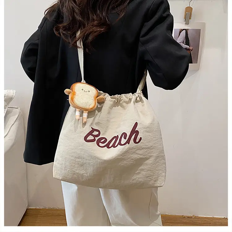 Red Drawstring Shoulder Bag with Cute Monkey Decor — feature 11