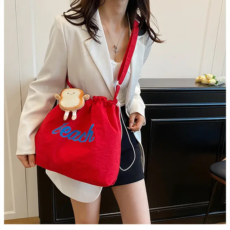 Red Drawstring Shoulder Bag with Cute Monkey Decor — feature 14