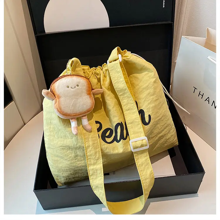 Women's Yellow Printed Tote Bag with Cute Doll
