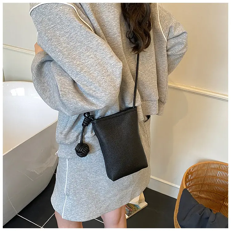 Beige Crossbody Phone Bag with Knot Detail 2025 — feature 18