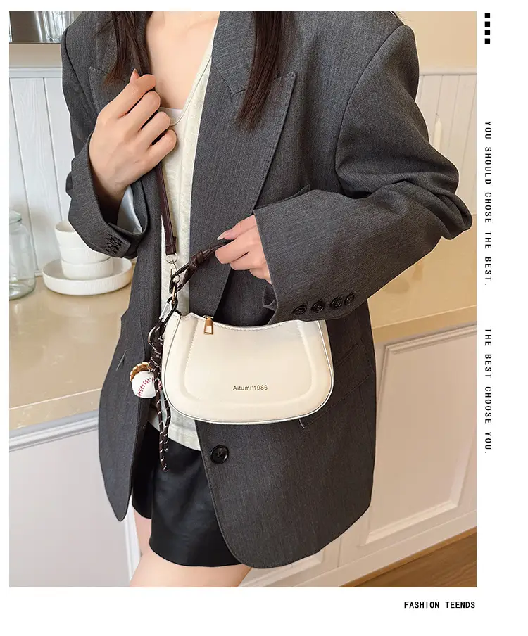 Women's Cream Leather Shoulder Bag with Charm — feature 1