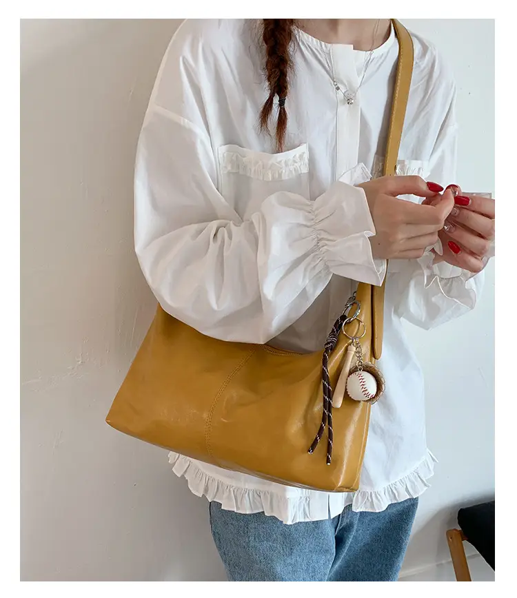 Retro Yellow Women's Shoulder Bag with Pom Pom Decor — feature 18