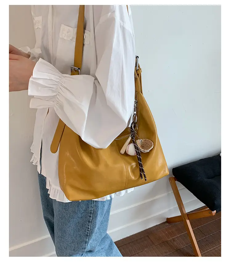 Retro Yellow Women's Shoulder Bag with Pom Pom Decor — feature 19