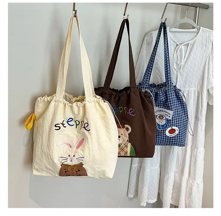 Women's Drawstring Canvas Shoulder Bag with Bunny Design — feature 2