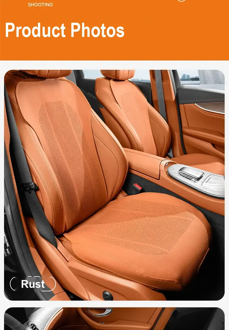 Orange seat covers fitted to the front seats of a car.