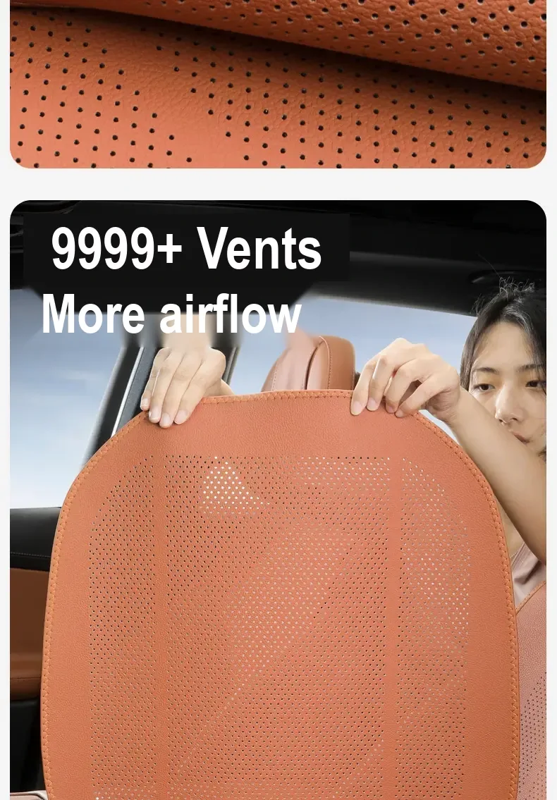 Person holding an orange perforated seat cover inside a car.