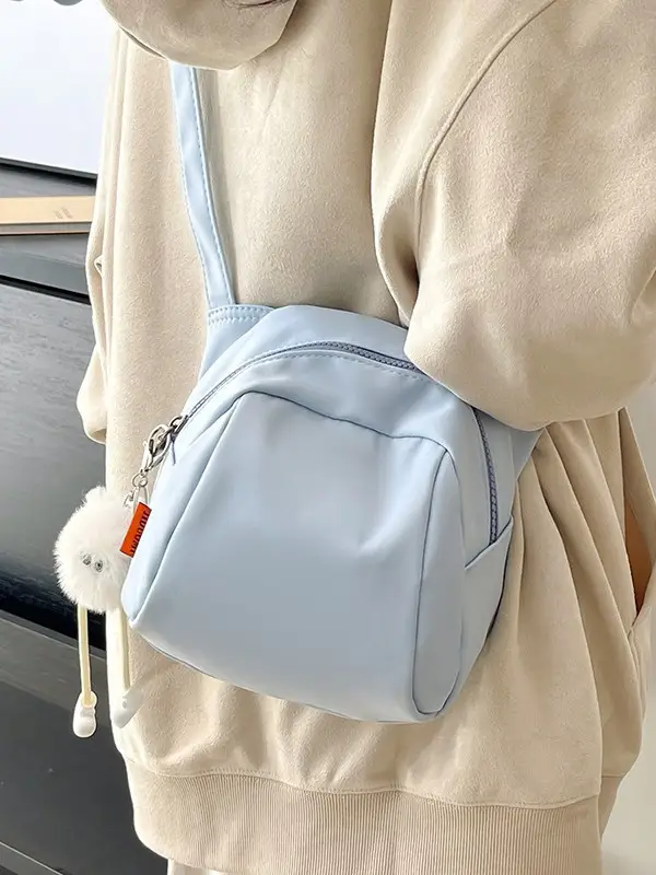 Women's Creamy Shell Shoulder Bag with Pom Pom Charm - Image 5