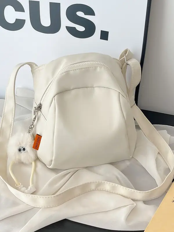 Women's Creamy Shell Shoulder Bag with Pom Pom Charm - Image 7
