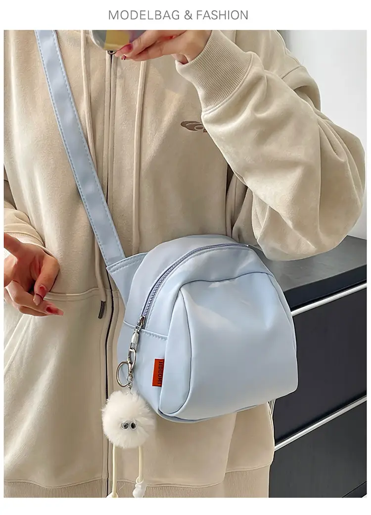Women's Creamy Shell Shoulder Bag with Pom Pom Charm — feature 13