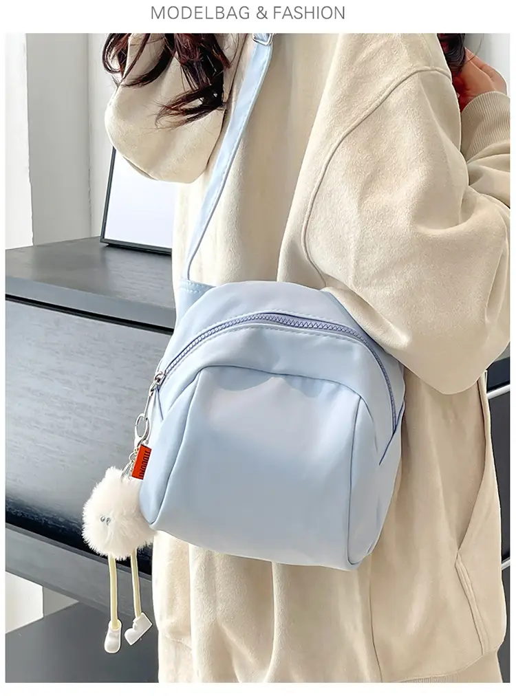 Women's Creamy Shell Shoulder Bag with Pom Pom Charm — feature 15