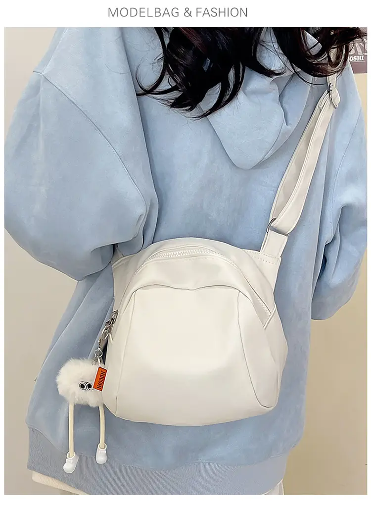 Women's Creamy Shell Shoulder Bag with Pom Pom Charm — feature 17