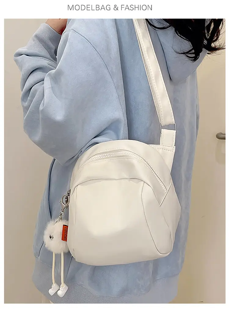 Women's Creamy Shell Shoulder Bag with Pom Pom Charm — feature 18