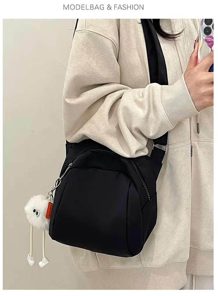 Women's Creamy Shell Shoulder Bag with Pom Pom Charm — feature 21