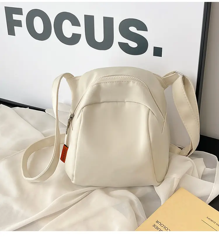 Women's Creamy Shell Shoulder Bag with Pom Pom Charm — feature 28