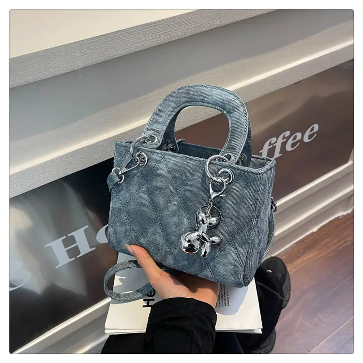 Luxury Grey Quilted Shoulder Bag with Chain Detail - Image 1