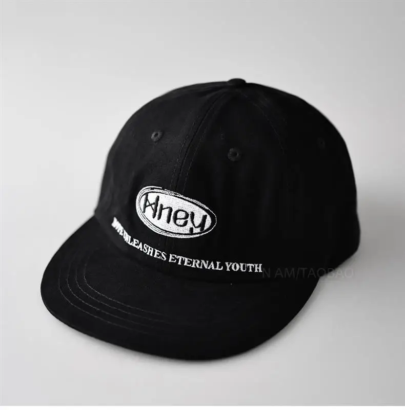 Black Knewa Letter Embroidered Baseball Cap Unisex — feature 1