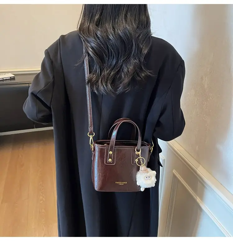 Black Embossed Crossbody Bag for Women 2026 — feature 18