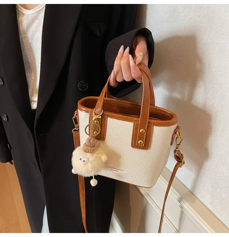 Black Embossed Crossbody Bag for Women 2026 — feature 21