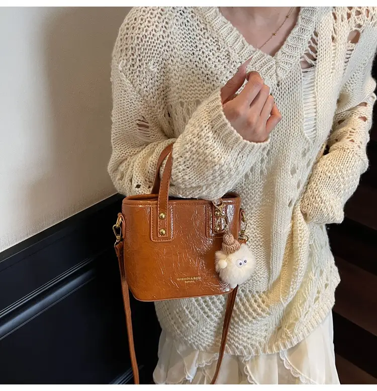 Black Embossed Crossbody Bag for Women 2026 — feature 25