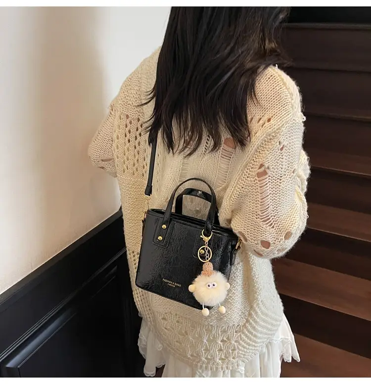 Black Embossed Crossbody Bag for Women 2026 — feature 30