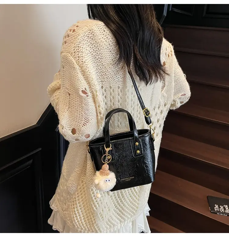 Black Embossed Crossbody Bag for Women 2026 — feature 32
