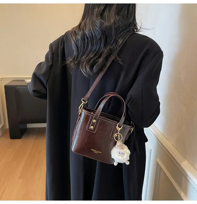Black Embossed Crossbody Bag for Women 2025 — feature 19