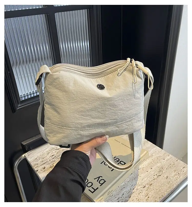 Lightweight Three-Layer Women's Crossbody Bag — feature 1