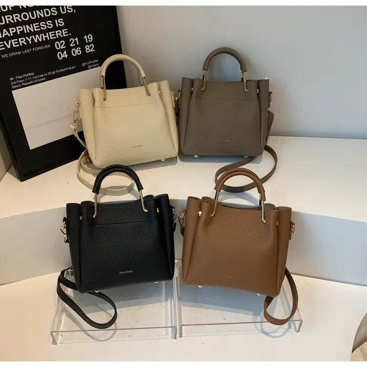 Women Retro Brown Bucket Bag Large Capacity Commuter Crossbody luggage and leather goods — feature 10